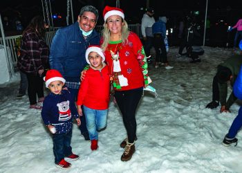 Holiday Extravaganza Family in Snow